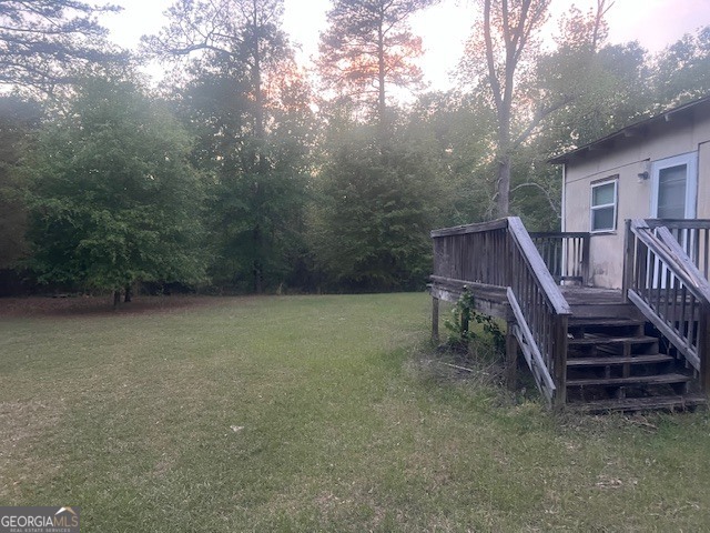 9742 South Sparta Davisboro Road Warthen, GA 31094 - Photo 13 of 39 a view of outdoor space and deck