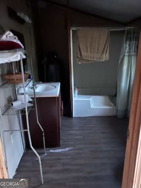 9742 South Sparta Davisboro Road Warthen, GA 31094 - Photo 22 of 39 a room with wooden floor and furniture