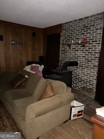 a bedroom with a bed and a mirror