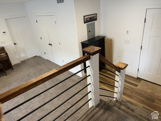 175 North 160 East Hurricane, UT 84737 - Photo 20 of 43 Stairs with electric panel, carpet flooring, and wood finished floors