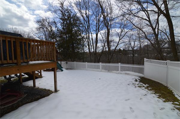 115 Booth Street, Unit 115 Needham, MA 02494 - Photo 15 of 15 a view of backyard with furniture