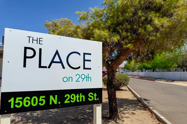 a sign on the side of a road