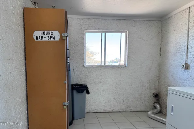 a close view of a sink a stove and refrigerator