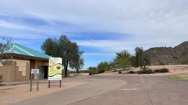 a view of a cafe with sitting area