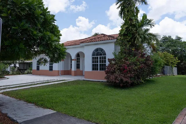a view of outdoor space yard and front view of a house
