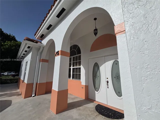 a front view of a house with entryway