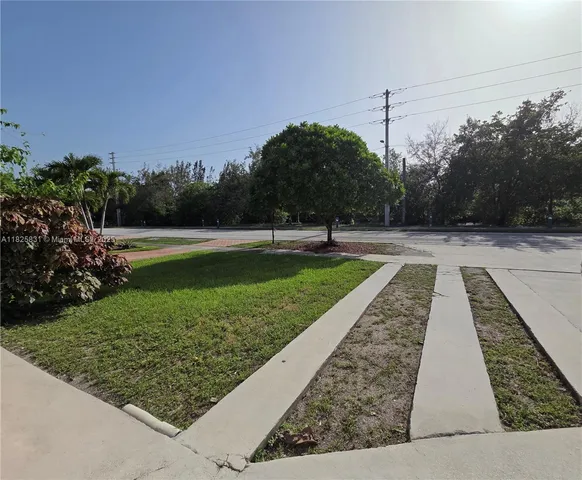 a view of a yard with a slide