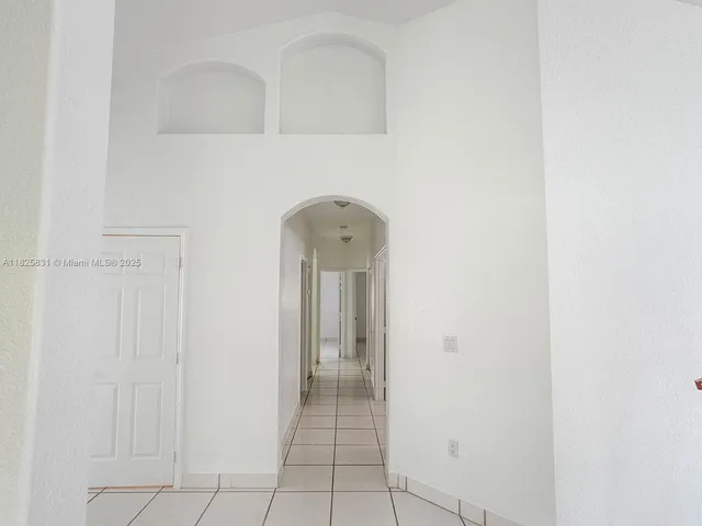 a view of a hallway with closet
