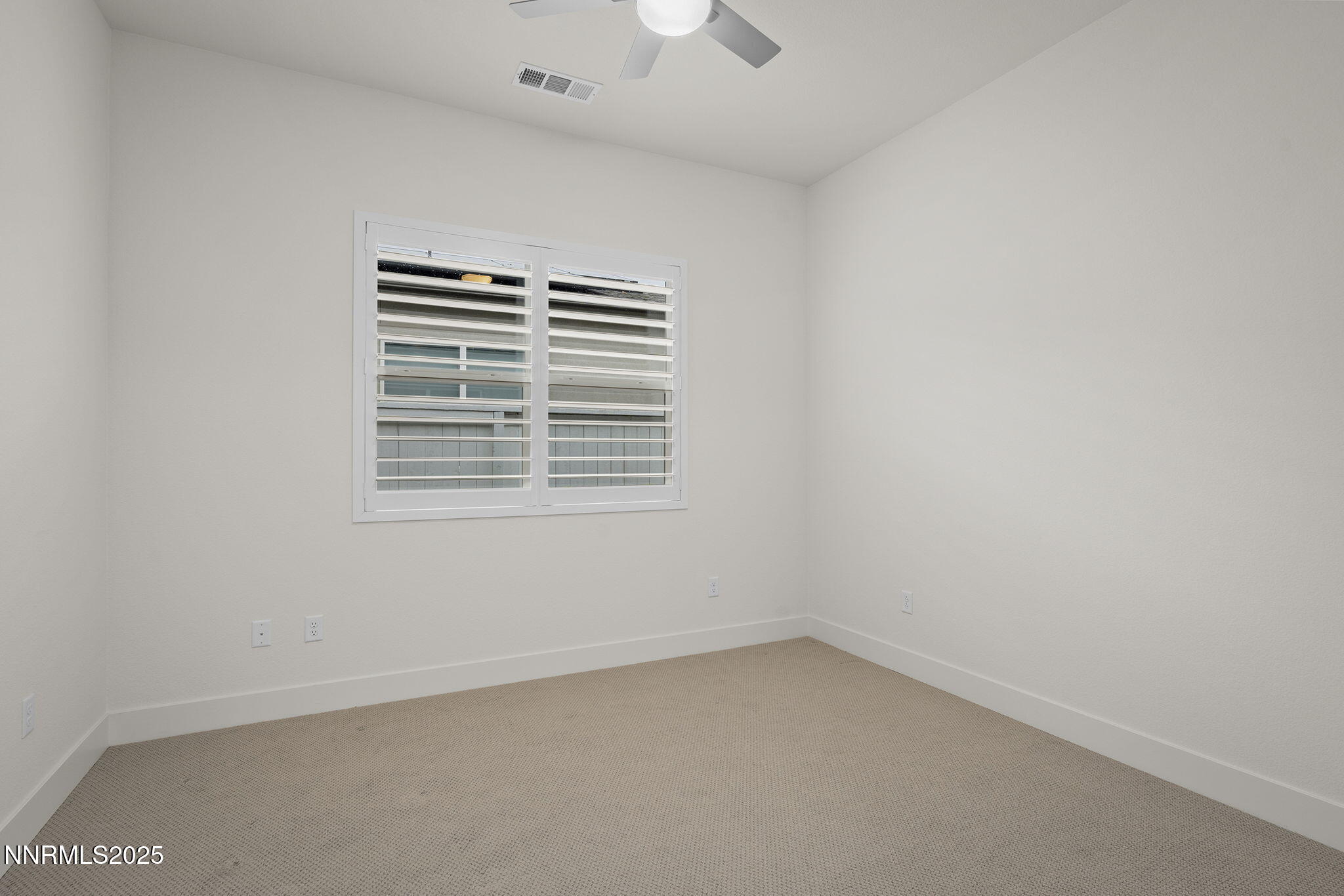 5513 Western Rider Trail Reno, NV 89511 - Photo 19 of 36 an empty room with a window
