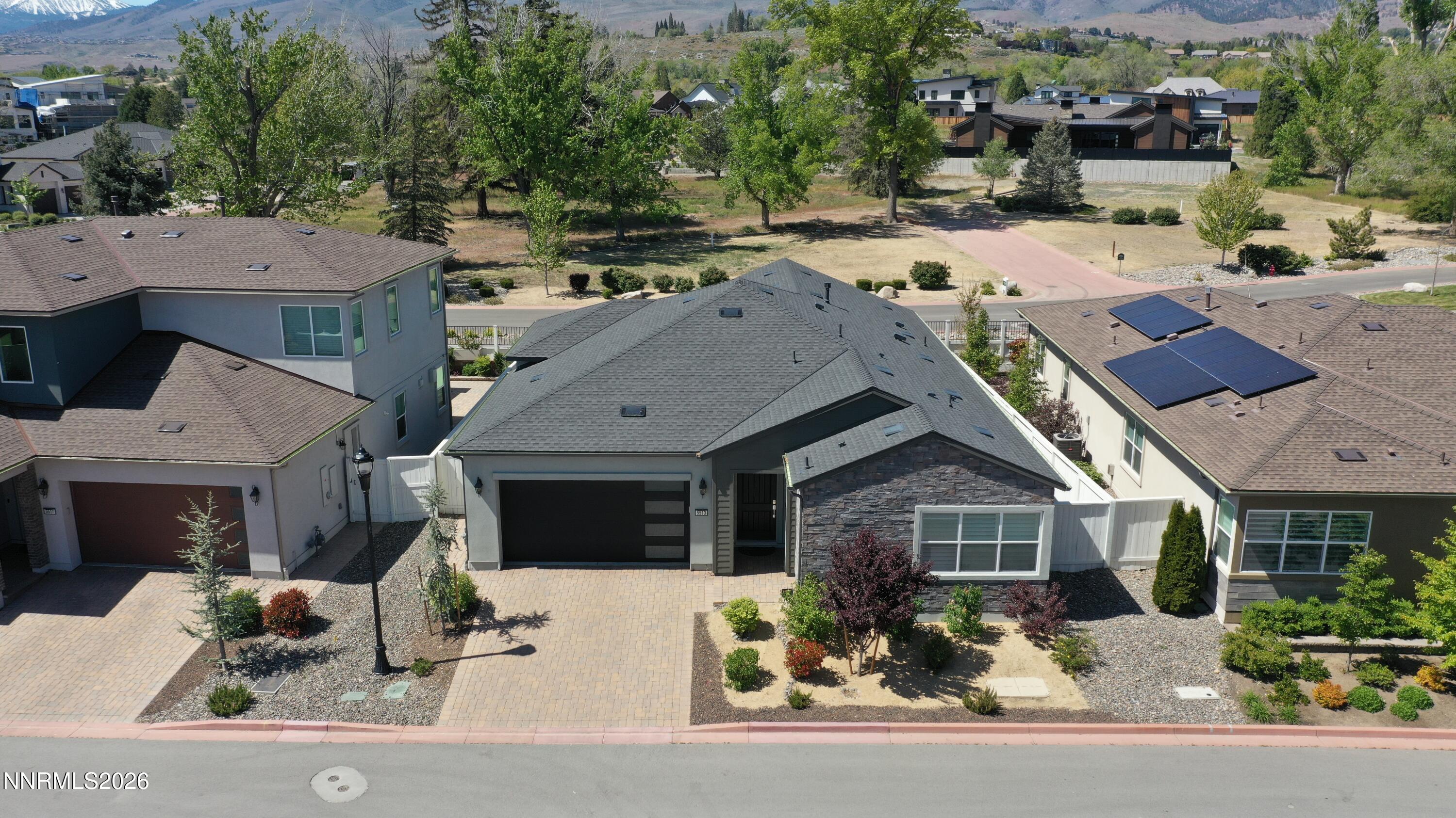 5513 Western Rider Trail Reno, NV 89511 - Photo 2 of 36 front view of a house with a view of a house