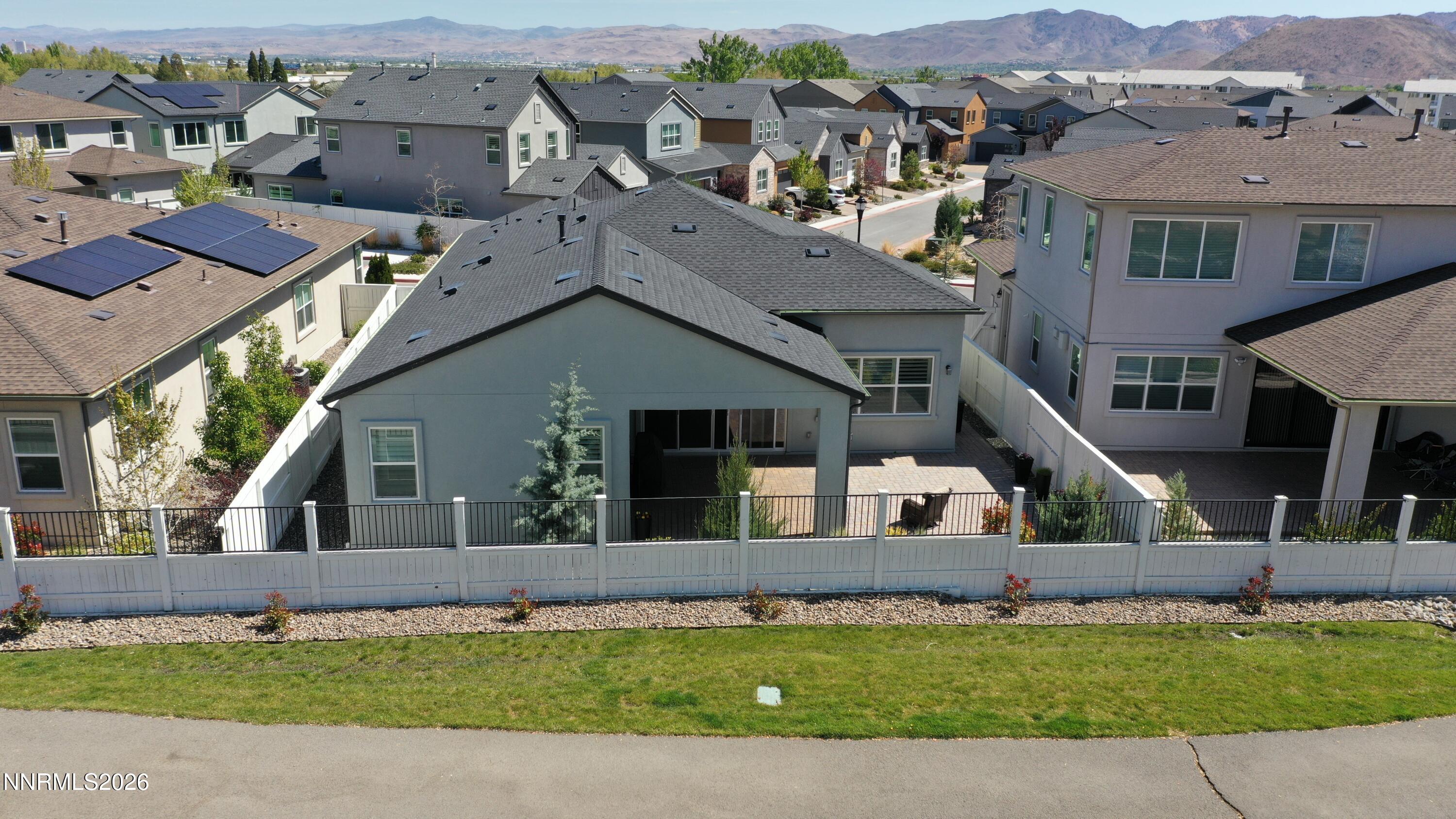5513 Western Rider Trail Reno, NV 89511 - Photo 25 of 36 a view of house with a garden