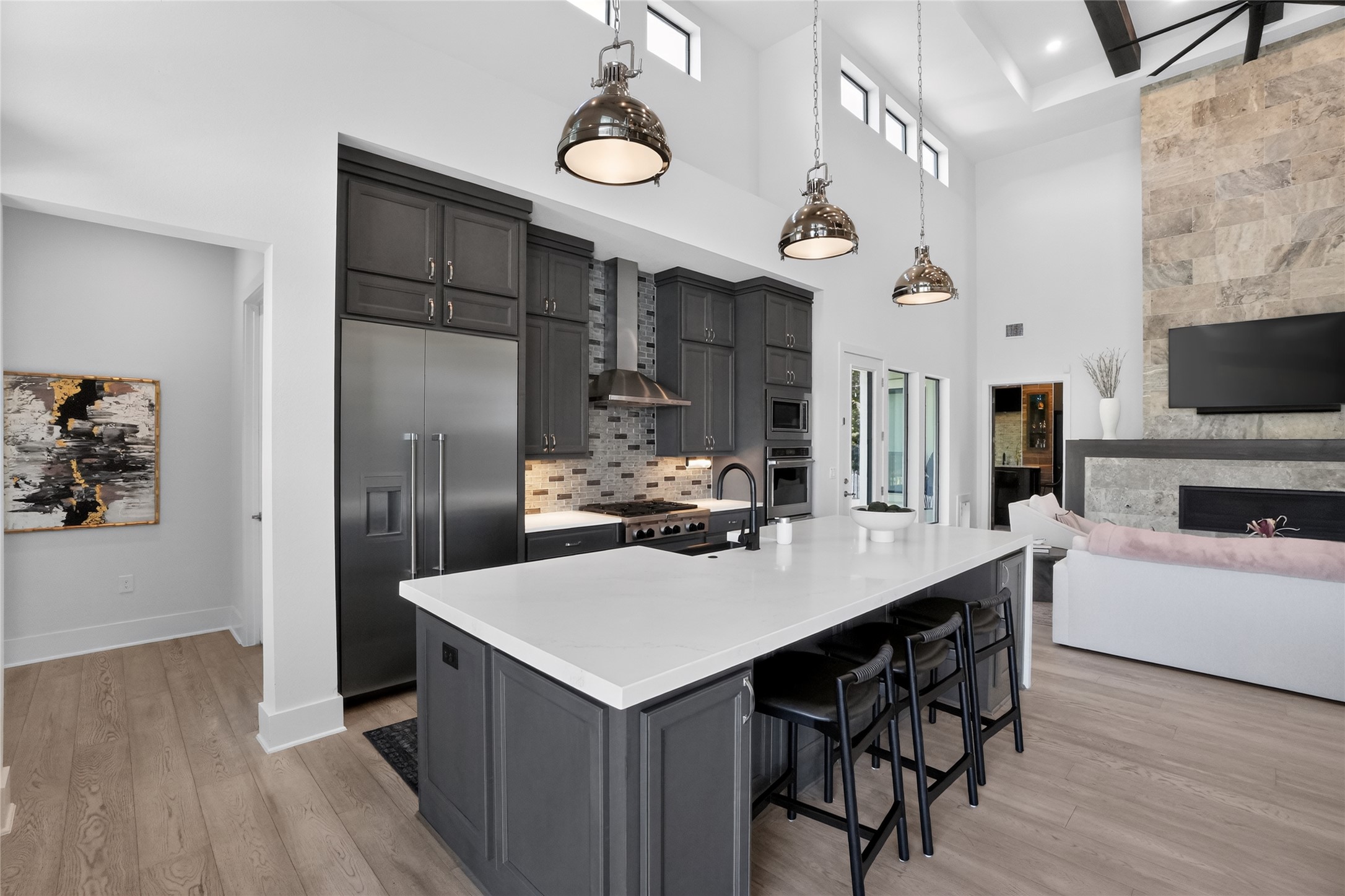 14916 Copper Ridge Lane Austin, TX 78734 - Photo 8 of 35 Culinary excellence meets effortless living in this bright, open-concept kitchen with high ceilings and a welcoming island.