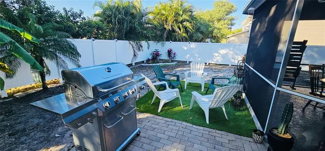 a view of a patio in backyard