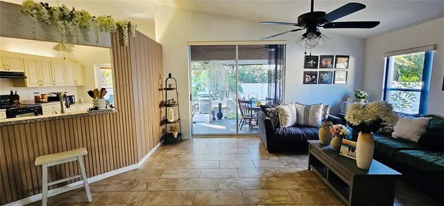 a living room with furniture and a window