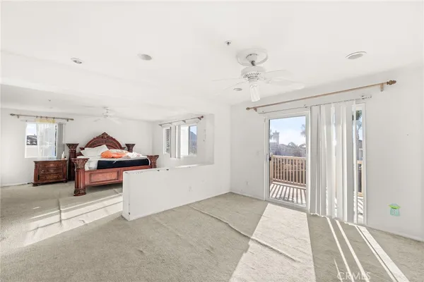 a view of livingroom with furniture and windows