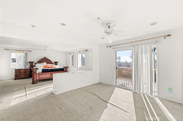 a view of livingroom with furniture and windows