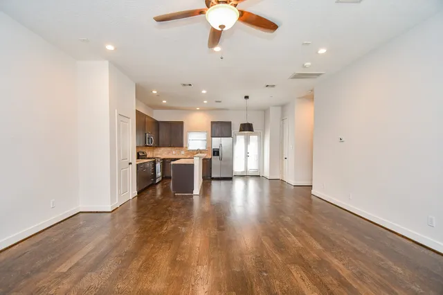 a view of kitchen with wooden floor