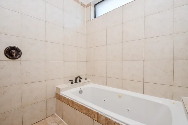 a bathroom with a bathtub