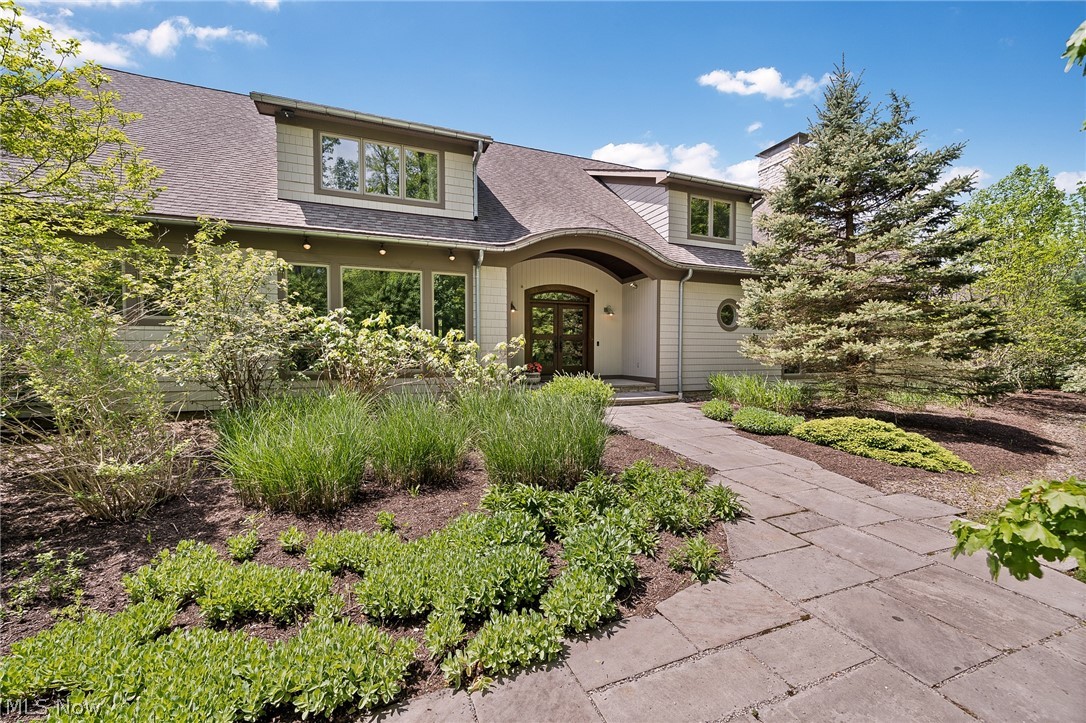 Sited quietly on a cul-de-sac, 10 Pepper Ridge welcomes you with understated refinement and warmth.
