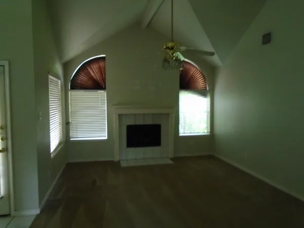 a living room with a fireplace