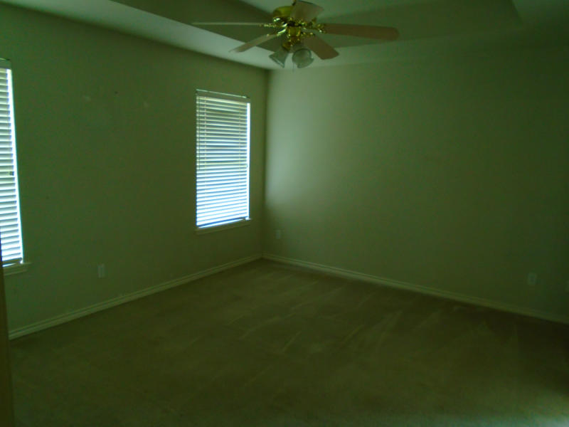 7817 Duchess Street Corpus Christi, TX 78413 - Photo 8 of 11 a view of an empty room with a window