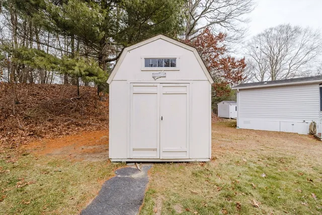 a view of entrance gate and trees