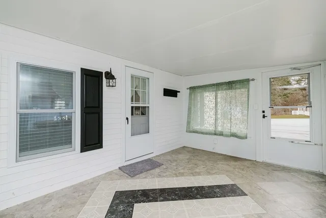 a view of an empty room with window