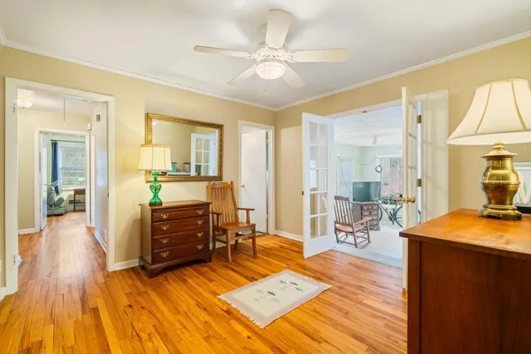 a bed room with a bed and dresser
