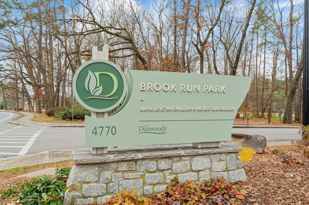 2368 Peeler Road Dunwoody, GA 30338 - Photo 36 of 47 a sign that is on the side of a road