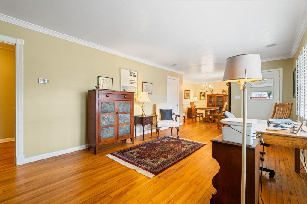 2368 Peeler Road Dunwoody, GA 30338 - Photo 7 of 47 a room with furniture and a table