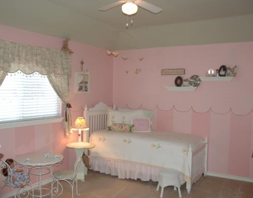 5102 Spring Brook Drive Corpus Christi, TX 78413 - Photo 7 of 8 a bedroom with a bed dresser and a window