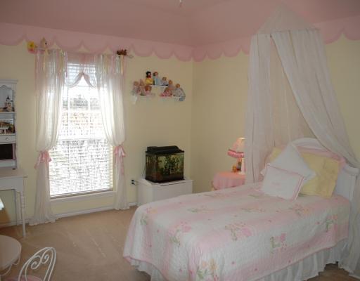 5102 Spring Brook Drive Corpus Christi, TX 78413 - Photo 8 of 8 a bedroom with a bed and a window