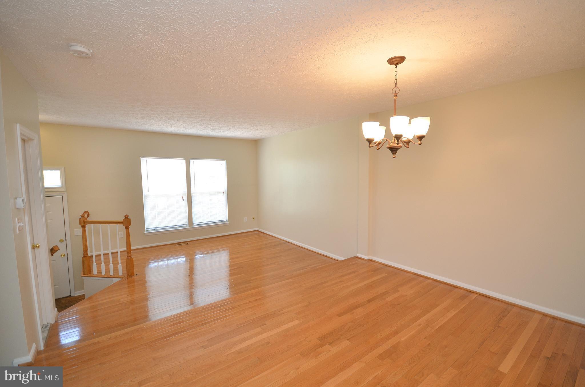 14091 Winding Ridge Lane Centreville, VA 20121 - Photo 11 of 29 Dining Room with Refinished Hardwood Floors