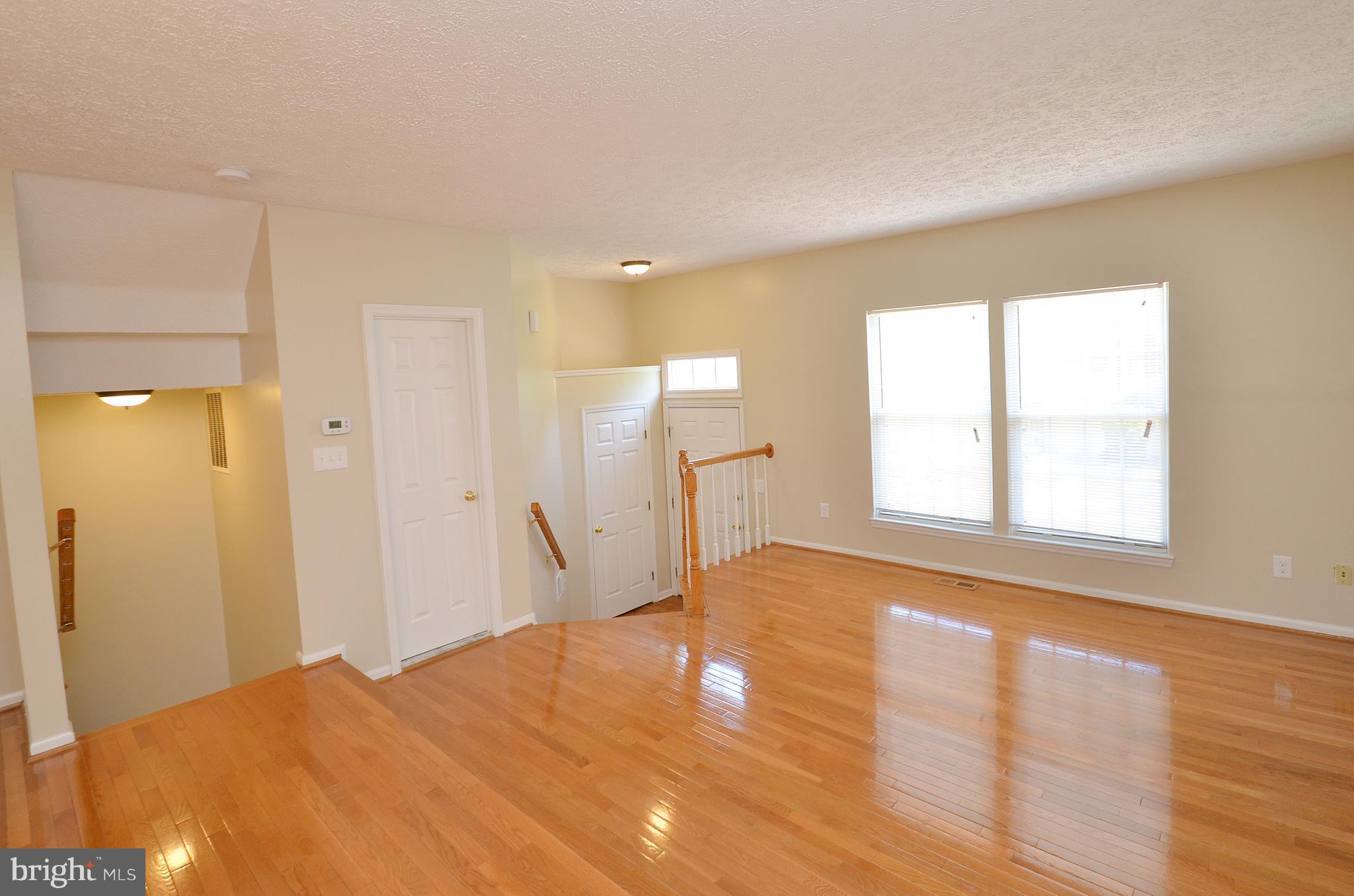 14091 Winding Ridge Lane Centreville, VA 20121 - Photo 9 of 29 Living Room with Refinished Hardwood Floors