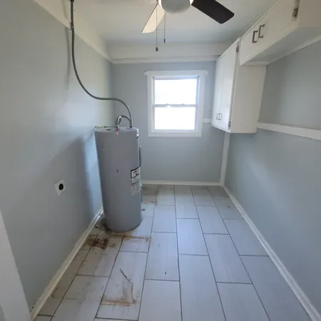 a room with a window and a table