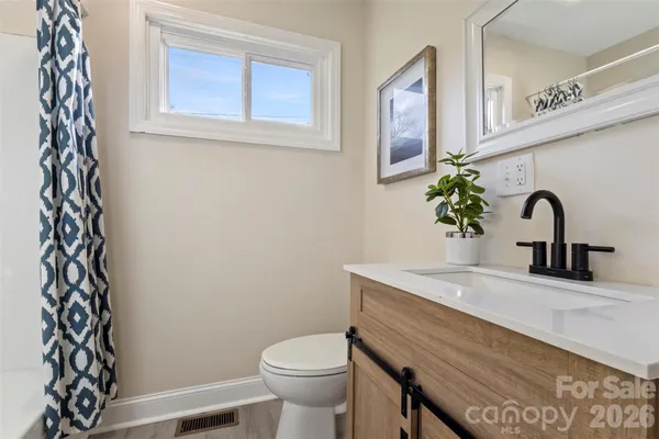 a view of a backyard with an outdoor space