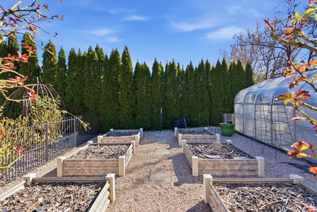 145 Carnesecca Court Mapleton, UT 84664 - Photo 83 of 109 View of yard featuring a vegetable garden, a greenhouse, an outbuilding, and a patio area