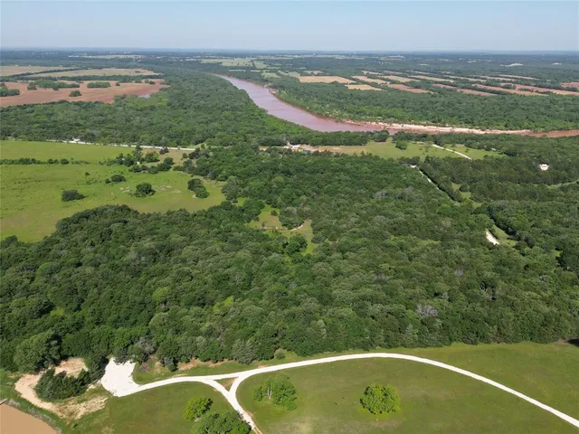 a view of a lake from a balcony