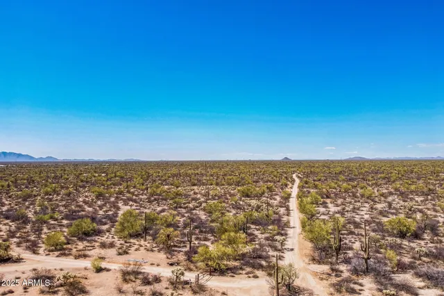 an aerial view of residential space with parking space