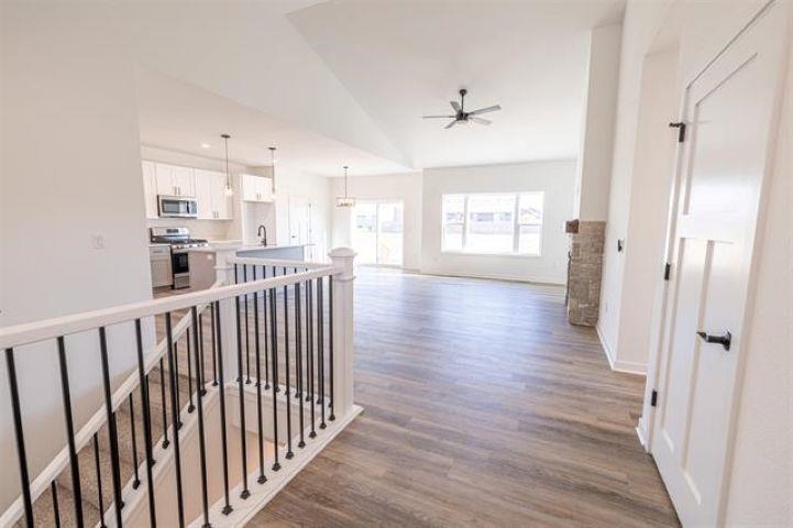 14200 Prairie Commons Lane South Beloit, IL 61080 - Photo 2 of 13 a view of a hallway with wooden floor and windows