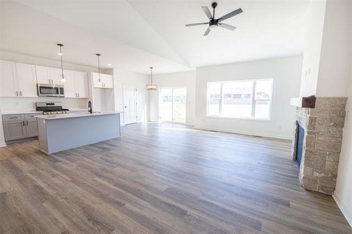14200 Prairie Commons Lane South Beloit, IL 61080 - Photo 3 of 13 a view of kitchen with sink and wooden floor