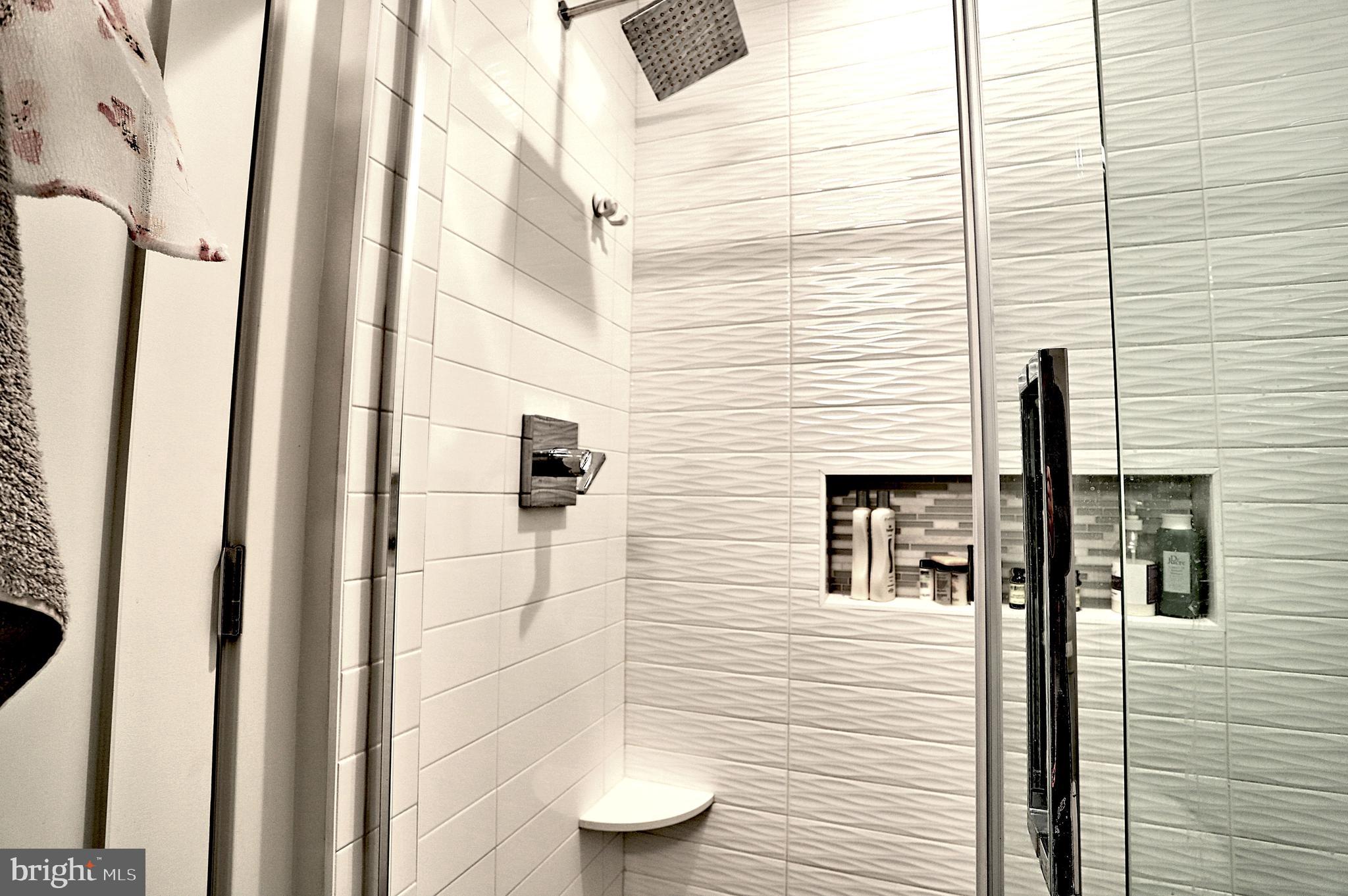 1723 Wisconsin Avenue Northwest, Unit C Washington, DC 20007 - Photo 13 of 18 a view of a bathroom with a shower