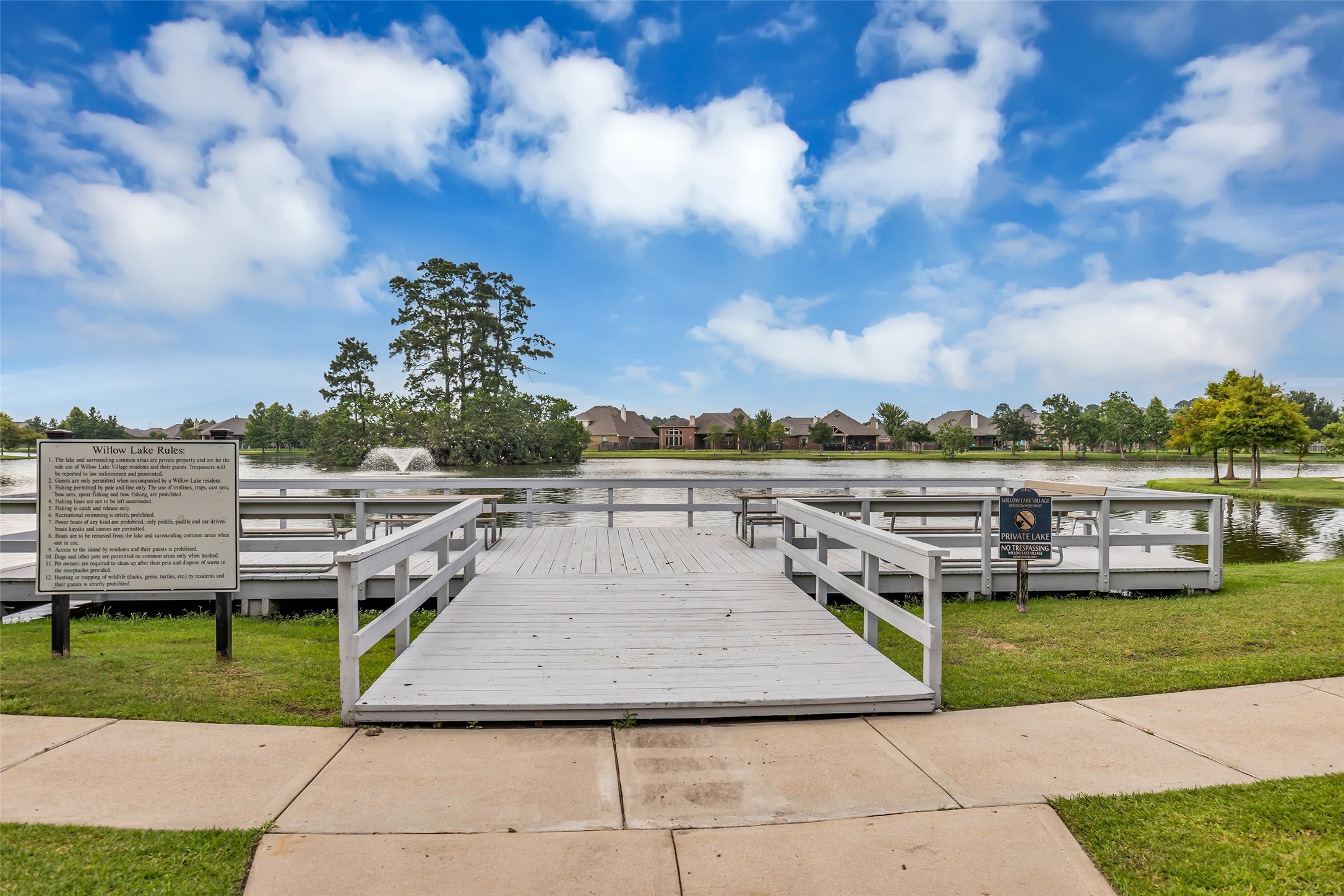 22907 Banff Brook Way Tomball, TX 77375 - Photo 23 of 26 Directly across the street from the home is Willow Lake, adding a scenic water view and a pleasant neighborhood setting.