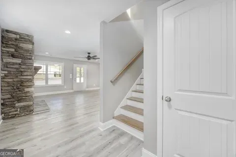 a view of entryway with wooden floor