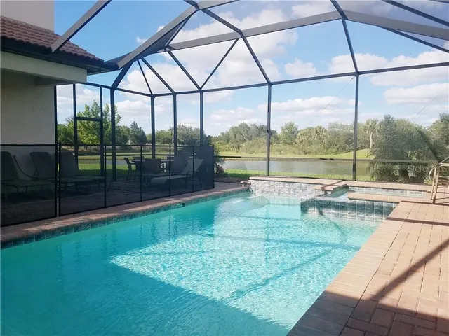 a view of outdoor space with swimming pool