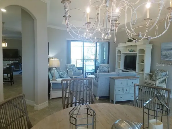 a kitchen with cabinets and window
