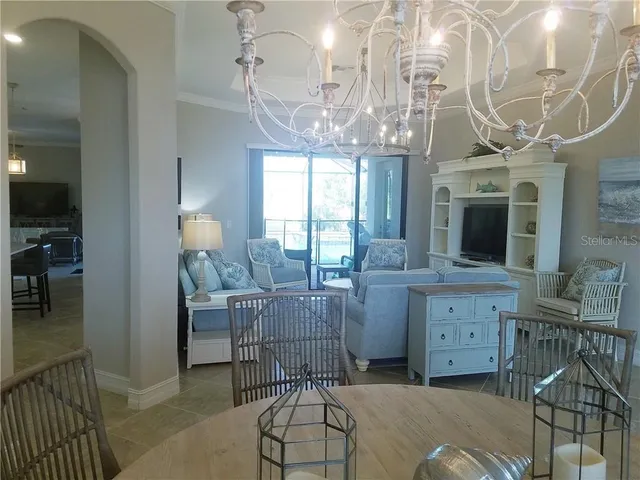 a kitchen with cabinets and window