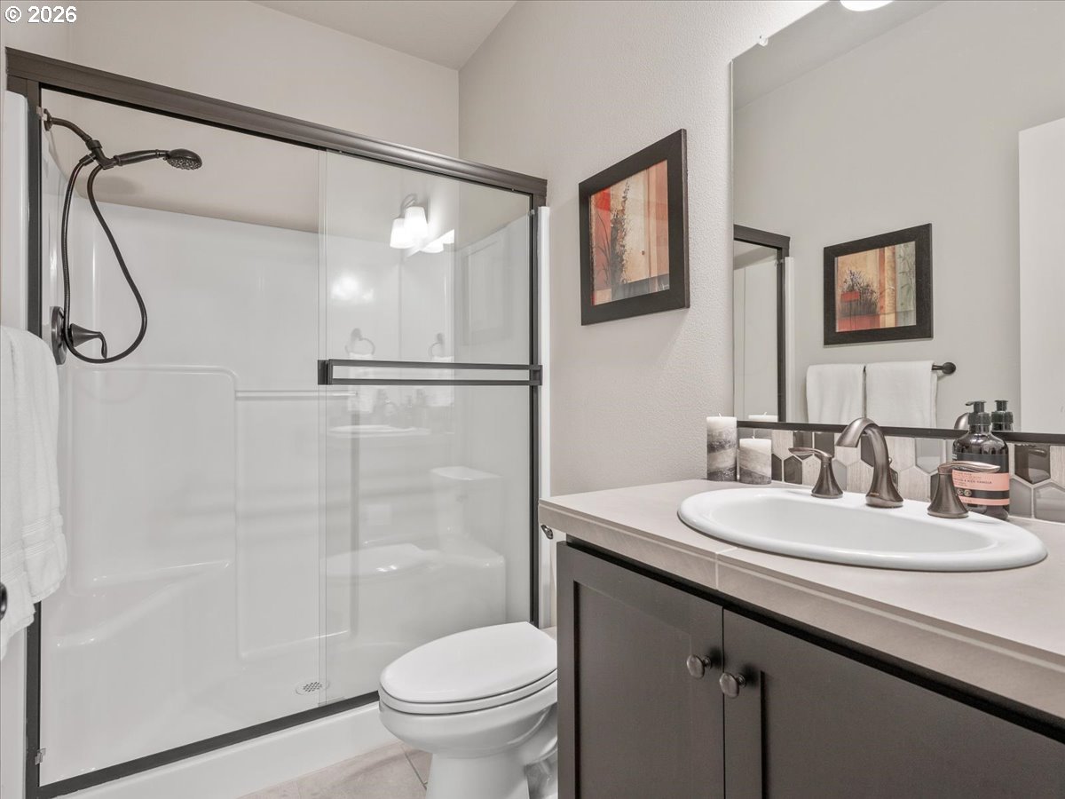 602 Northeast 149th Way Vancouver, WA 98685 - Photo 30 of 48 a bathroom with a sink toilet and shower
