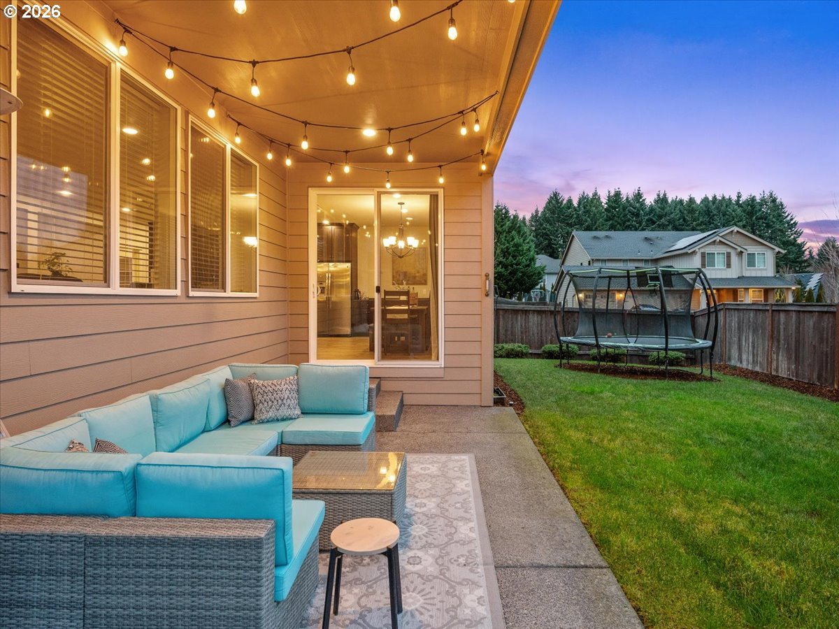 602 Northeast 149th Way Vancouver, WA 98685 - Photo 41 of 48 a view of a patio with couches table and chairs and potted plants