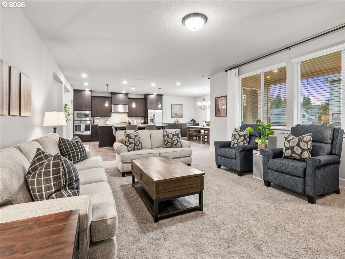 602 Northeast 149th Way Vancouver, WA 98685 - Photo 8 of 48 a living room with furniture and a large window